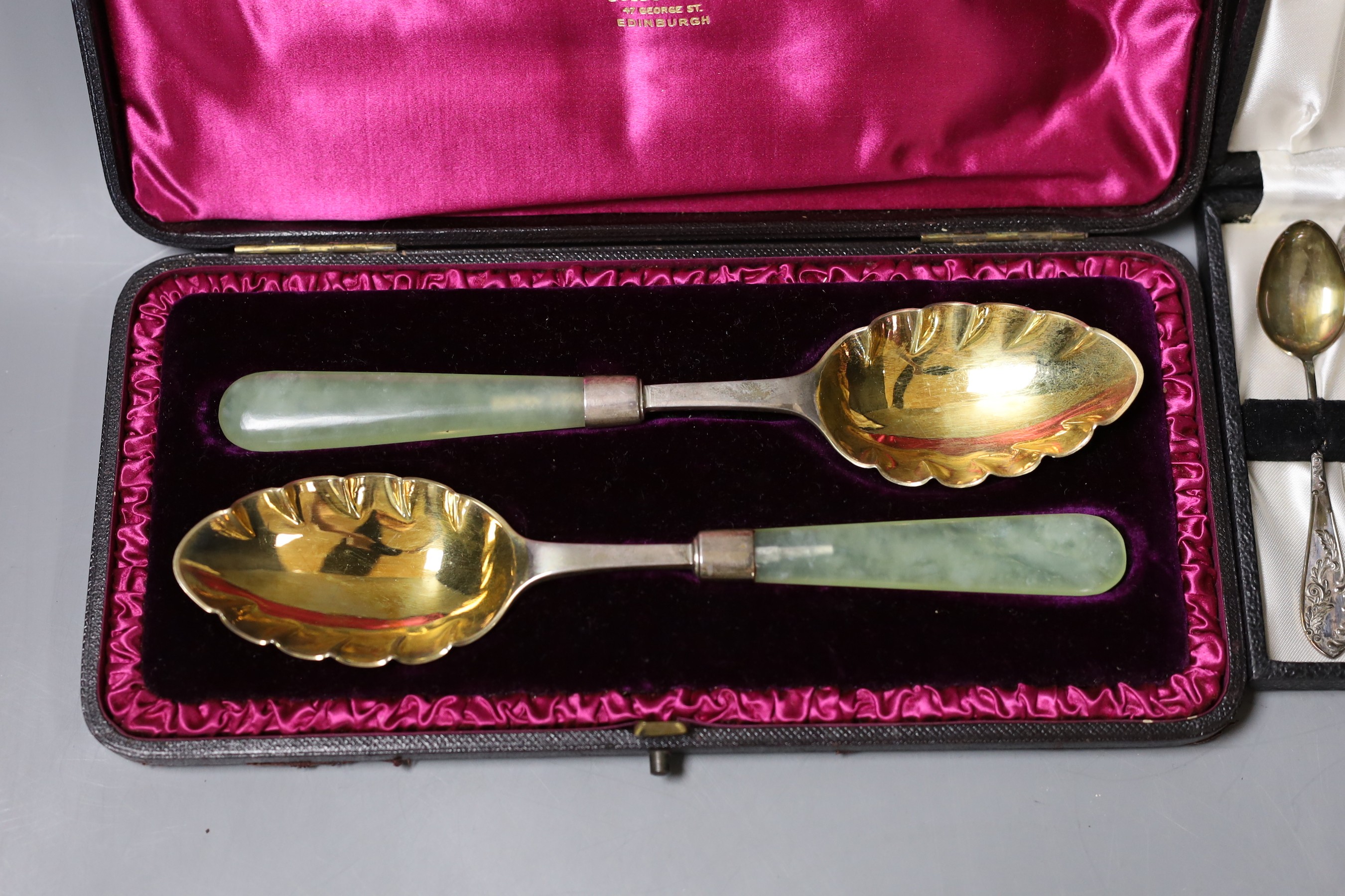 A cased pair of Victorian bowenite handled silver serving spoons, Edinburgh, 1888 and a cased set of six silver teaspoons.